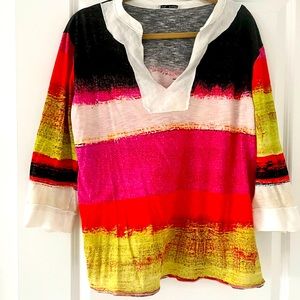 Great multi color shirt. Can be worn with jeans or a skirt